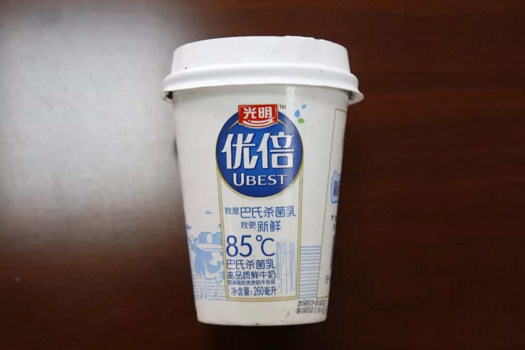 光明牛奶包裝盒上標識“85℃”是否侵權85度C品牌的商標權？