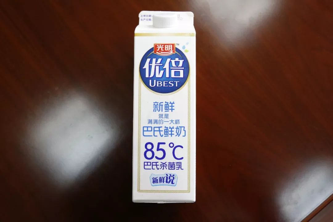光明牛奶包裝盒上標識“85℃”是否侵權85度C品牌的商標權？